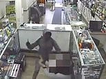 Shocking moment store worker is brutally attacked during robbery