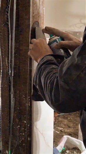 Tiling process on a square column. Done.