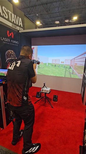 #SHOT2026 day 1 in the books. Great to see folks trying the Smokeless Range. This 16 year old grand master took it for a spin #SmokelessRange #dryfiretraining #JPRifles #ironsnodot lol | Laser Ammo