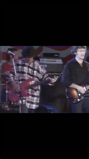 26K views · 7.7K reactions | John at Farm Aid in 1985 performing “The Old Man Down The Road” at Memorial Stadium in Champaign, Illinois. Organized by Willie Nelson, John Mellencamp, and Neil Young, the 14-hour event drew 80,000 attendees. | John Fogerty | Facebook