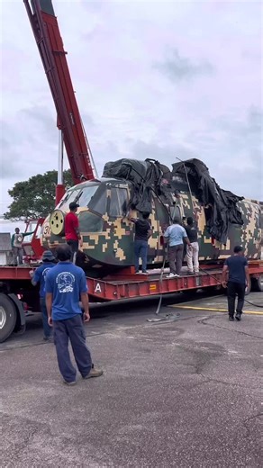 Military Helicopter Unloading at Airport Tarmac