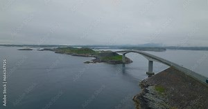 Iconic Storseisundet bridge on famous Norwegian Atlantic Ocean Road. Aerial