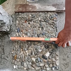 43K views · 445 reactions | How to install river smalll rocks on floor | Andris Brick Art | Facebook