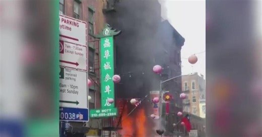 Firefighters battle massive fire at Chinatown building