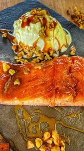 Smoked Candied Salmon Fillet Brined overnight with a splash of maple syrup and 5 spices, then smoked for 3 hours brushing it maple syrup every 20 minutes—Let’s get a little #Funky and serve this Smoked Candied Salmon Fillet with a side of vanilla ice cream 🤪🔥As always, thank to my MEATER for the perfect internal temp. | GrillHunters