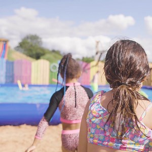 Join us as we bring the beach to Burton, every day between 20 July - 2 September at Farmarama! ☀️💦 | National Forest Adventure Farm