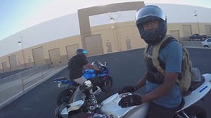 Combining fidget spinner tricks with motorcycle wheelies for a hilariously odd ride