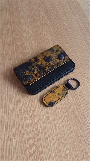Leathercraft patterns by Deyan on Instagram: "The Shipmate Wallet & matching keychain in Yellow Aqua & Black Country leathers from @concerialaperlaazzurra 🫠 Wallet pattern: https://dsleathergoods.etsy.com/listing/1710440109 Also that song on repeat! 🤘 Happy crafting, Deyan ❤️"