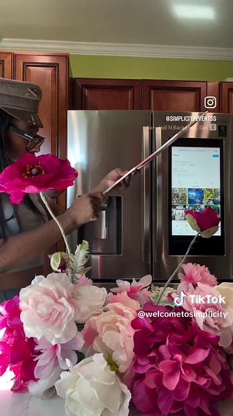 We love creating Centerpieces and this one was nothing short of fun! We used our shades of pink faux flower arrangement, adding on an oversized Barbie head and pops of pink and sliver mirror disco balls. The coolest thing about this centerpiece base it can be reused and styled in many different ways! #behindthescenes #diy #diyproject #barbie #contactus #💕