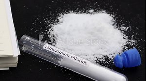 ammonium chloride in test tube and black background