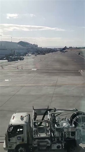 The large taxi parking grounds grand view in glass hallway Portland Airport in Oregon USA, 6/20/2026