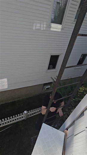 Testing out their escape ladder. | Safer Escape Ladders