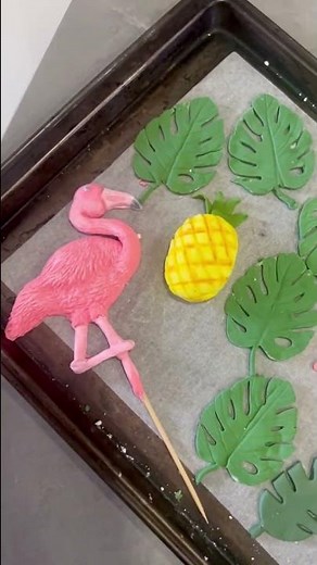 A colorful birthday cake for a luau-themed party