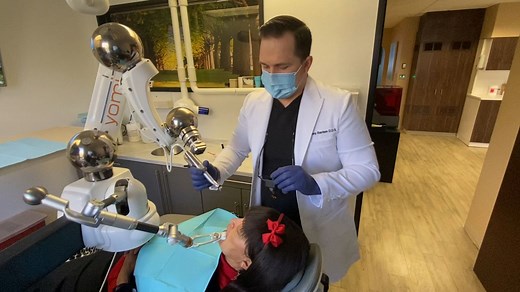 Dentist becomes 1st in LA to use Yomi robot for dental implants