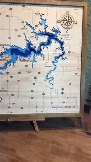 Theses are 3D 5 layered wood lake maps done with a co2 laser check us out on Facebook !