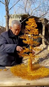 52K views · 437 reactions | It's nice to have a handy husband. Ahead of the Spring Festival, this elderly man made a "fortune tree" for his wife using a larger number of metal wires. #Craftsmanship #YearofTiger #FunChina | China Plus Culture | Facebook
