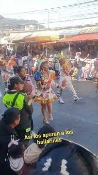 This prevents the dancers from dancing in the Gran Poder procession; they force them to hurry.