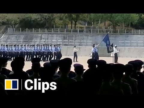 Hong Kong Police marching in the Chinese military style