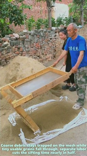 Two Workers Team Up With Homemade Wooden Screen To Filter Clean Fine Building Sand