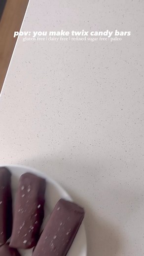 these diy twix candy bars are gluten free, dairy free, paleo, and refined sugar free, and so good! #twixbar #twix #vegantwix #healthytwix #homemadetwix #homemadecandy #candybar #glutenfreedessert #dairyfreedessert #paleodessert #refinedsugarfree #chocolatebar #healthytreats | The Bigley Basics