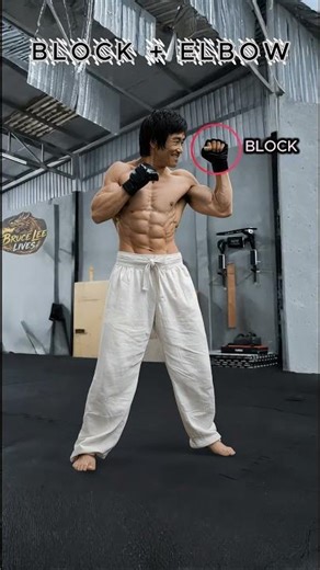 Master Bruce Lee’s Unstoppable Block & Elbow Strike ⚡️#usa #Shorts #BruceLee #MartialArts