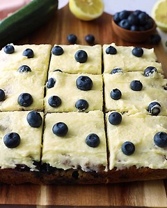GORGEOUS lemon blueberry zucchini cake with a luscious lemon frosting for #AKZucchiniWeek day 2 😍 it's gluten free, naturally sweetened bursting with juicy blueberries! RECIPE: https://www.ambitiouskitchen.com/lemon-blueberry-zucchini-cake/ | Ambitious Kitchen