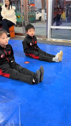 Artistic Viral | Inside a Chinese Kung Fu academy, young students take on a demanding Wushu-inspired challenge, rolling from their backs to a full standing... | Instagram