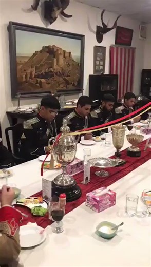 Why is there a random man playing bagpipes circling the table as they eat dinner? I get you want to emulate the British, but are you emulating British cartoons?