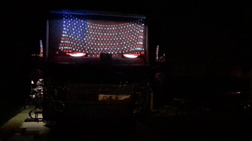 A video with the eyes 👀 moving underneath the flag, but it doesn’t compare to real life view. It has eyelids and lashes that move around. | River View RV Park