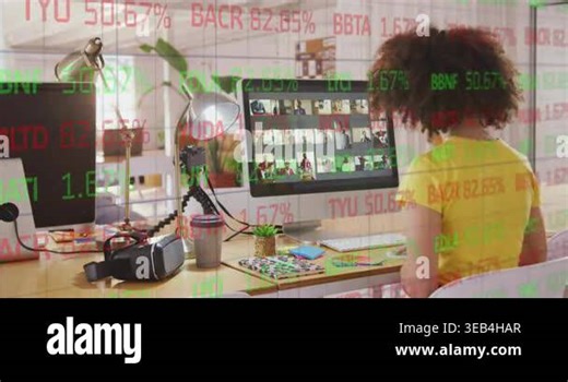 Animation of stock market data processing against african american woman using computer at office. Global economy and business technology concept Stock Video Footage - Alamy