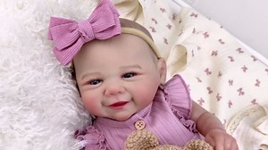 Aori Lifelike Reborn Baby Dolls - 20 Inch Realistic Smiling Girl Newborn Baby Doll with Weighted Body for Cuddling Poseable Soft Vinyl Limbs with Purple Outfit Set for Girls 3+