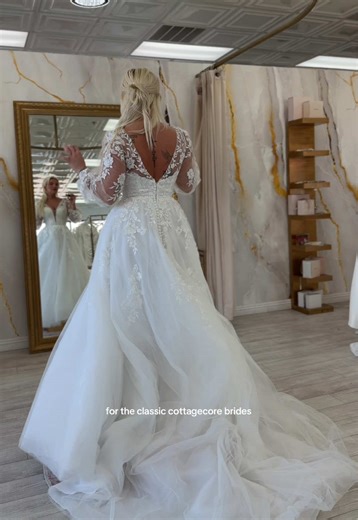 giving running through the woods with flowers in my hair ladies dress: @Strut Bridal Salon #bridaltiktok #weddingdressshopping #romanticweddingdress