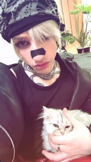 Dark Warts on Instagram: "Cuddling w my friends cat made me want a pet but I can’t afford a cat so I’m thinking I’ll get a fancy rat"