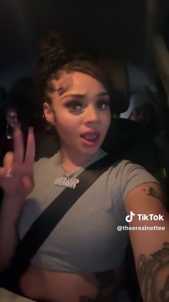 Playful Car Poses and Hand Gestures at Night