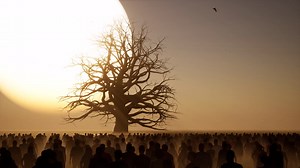 A huge dead tree with many branches on a desert, arid environment, with crowd standing idle on sunset with dark shadows, 3D animation, 3D scene, dystopian theme, camera dolly left to right slowly | Premium Stock Video Footage