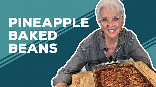 A couple girls down at the restaurant shared their fabulous pineapple baked beans casserole recipe with me years ago. Click here to get Sue & Gloria's Baked Beans recipe: https://www.pauladeen.com/recipe/sue-and-glorias-baked-beans/ | Paula Deen