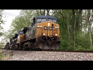 CSX train freight with mow equipment