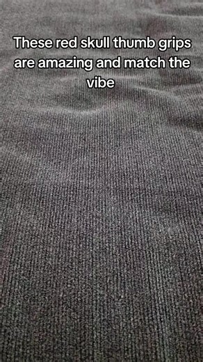 Enhance Your Game with Red Skull Thumb Grips