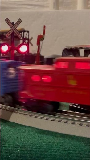 Wired up a Lionel 252 crossing gate to my infrared triggered gatehouse and crossing signal.