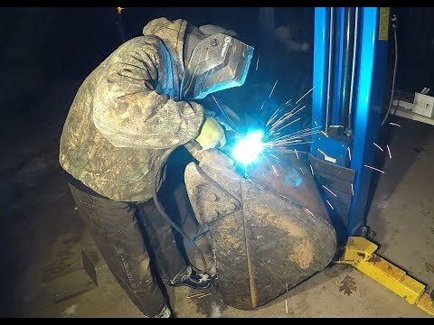 Welding an excavator bucket
