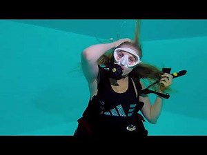 Female Diver is Diving with Swim Suit