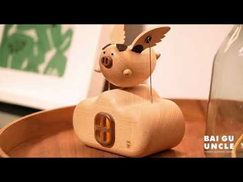 The flying pig wooden mechanical toy