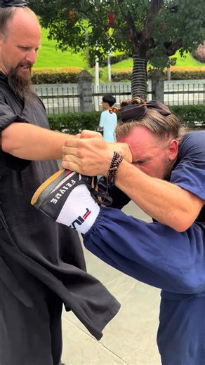 All about Martial Arts on Instagram: "#TuesdayMotivation: The hardship worth encouraging is the kind rooted in independent thinking, self-discipline and self-control, the kind that leads to positive change, not suffering for its own sake. American-born Jake Pinnick, now a 16th-generation disciple of the Wudang Sanfeng martial arts lineage, instructs a kung fu enthusiast in basic training. #martialarts #wushu #kungfu #training #wudang #meditation #TuesdayThoughts"