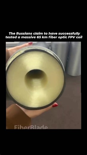Zynox on Instagram: "The post reports a Russian claim of successfully testing a 65 km fiber optic spool for FPV drones, demonstrated in a video showing spool unwinding, connection, and drone flight over terrain with a visible cable trail, potentially enabling unjammable strikes at extreme ranges. - Fiber optic FPVs counter electronic warfare by using physical cables instead of radio signals, evolving from 2024 prototypes to battlefield staples in Ukraine by mid-2025, with Chinese-Russian firm PG