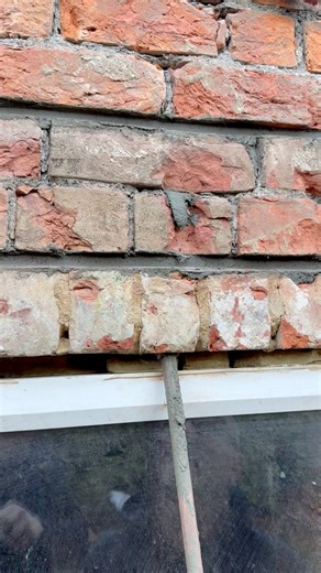 Masonry beam and pins. Quite common for timber windows to be removed and plastic ones installed. These you can find struggle to open because of the weight from the wall above. Basically the timber ones acted like a lintel and the plastic ones like to bow, because of the weight. In fairness on a rendered and plastered house it can be difficult to work out but when you take the window out and see bricks, you know there is no lintel…. This is an option of repair, where we install stainless steel ba
