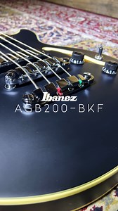 Check out the AGB200-BKF in a Black Flat finish. #Ibanez #IbanezAGB Key Features: ✅ Quik Change III Bass tailpiece ✅ Linden top / Linden back and sides ✅ Gibraltar III Bass bridge ✅ Classic Elite Bass Pickup ✅ Rosewood fretboard For more details visit Guitar, Amp & Keyboard Centre [https://bit.ly/4125zm6] | Ibanez UK