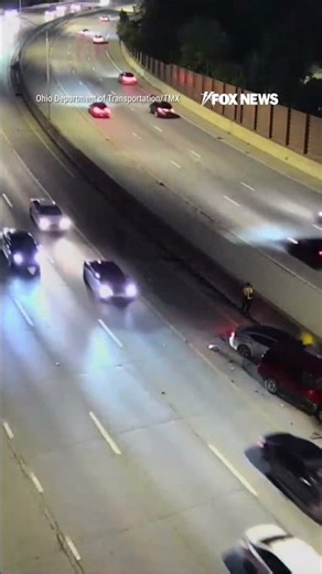 WATCH: Man NARROWLY ESCAPES being hit by car while stranded on highway #shorts #us #news #foxnews