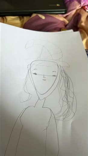 Drawing Elphaba step by step on my own.