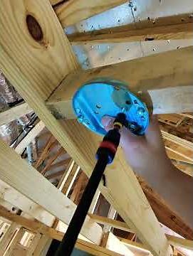 Installing a ceiling fan mount for electric roughing