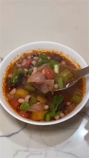 Rainbow Grocery Cooperative on Instagram: "The New Year's right around the corner! 🎉Try this delicious Black-Eyed Pea Soup! It's vegan and gluten free. It only takes 30 minutes to make! Black-eyed peas symbolize good luck and fortune. Wishing you a prosperous 2026! ✨ RECIPE: Ingredients: * 1/2 pound dried black eyed pea soup (soak for 8 hours overnight) @rancho_gordo [aisle 3] * 1 bunch chopped carrots (about 8 carrots) * 1 small yellow onion (diced, about 1/2 cup) * 1 medium celery (chopped) *